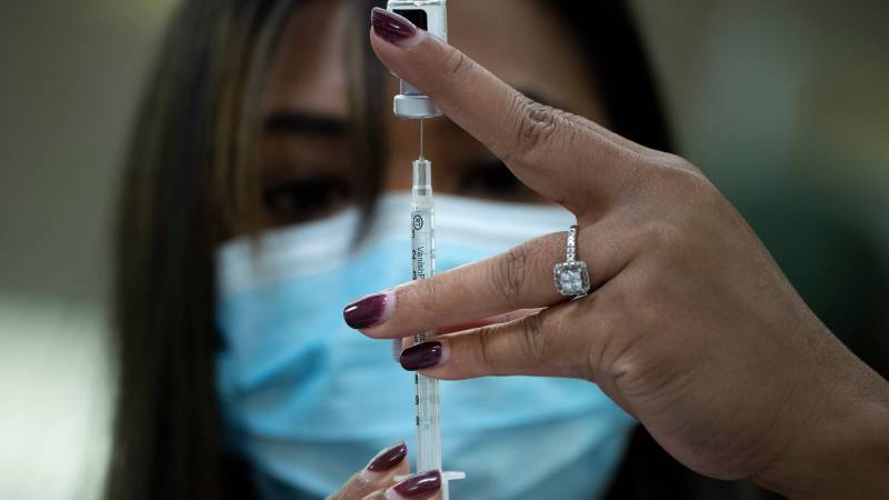 US officials reject Trump claims on virus toll, defend vaccine rollout