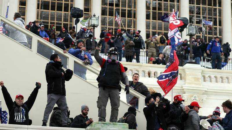 Mob storms US Capitol as Trump accused of 'coup'