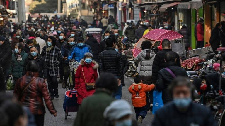 Wuhan bustles a year after world's first coronavirus lockdown