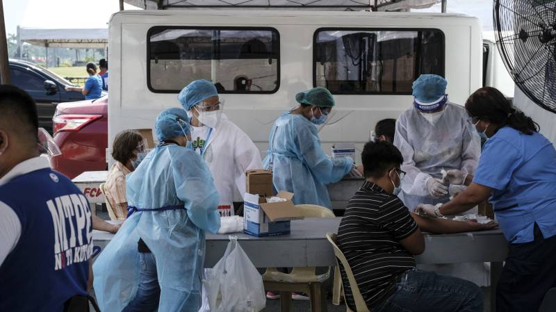 Targeted lockdowns in Philippine capital as virus cases surge