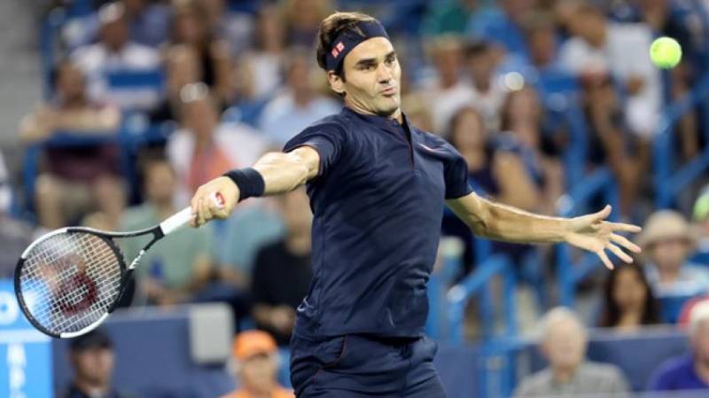 Roger Federer makes winning return after 13 months out