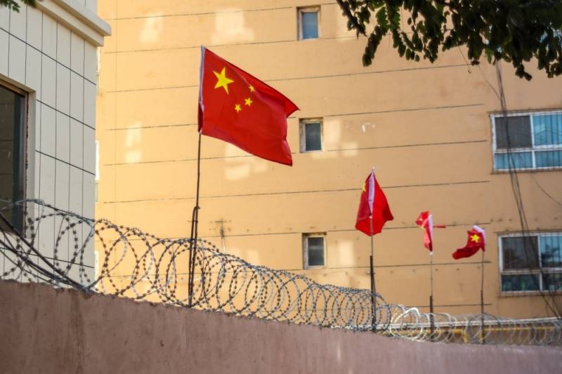 UK sanctions four Chinese officials over Xinjiang 'abuses'