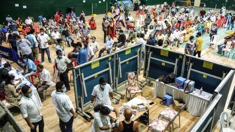 India hospitals overwhelmed by virus as Japan to declare emergency