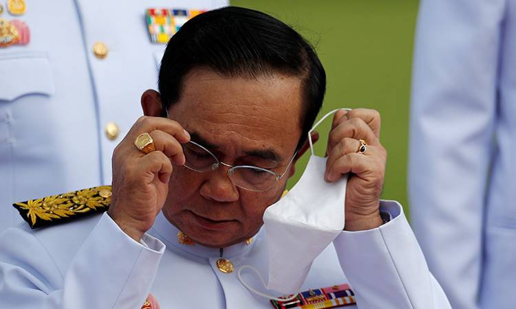 Maskless Thai PM fined as coronavirus cases spike