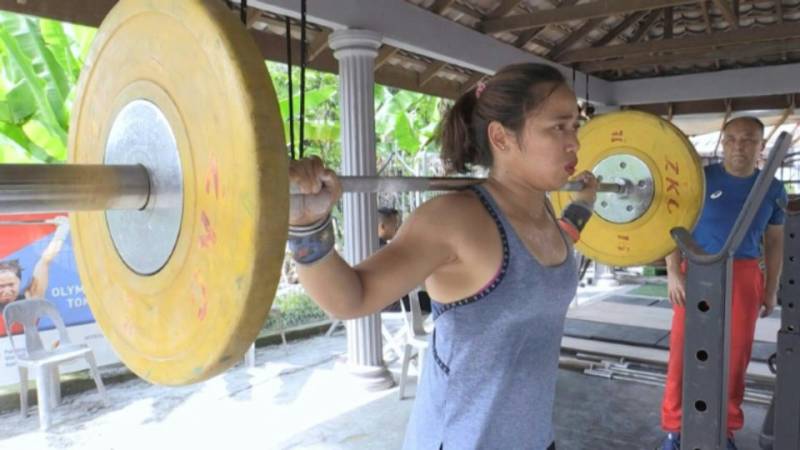 Far from home: Weightlifter’s quest for first Philippines Olympic gold