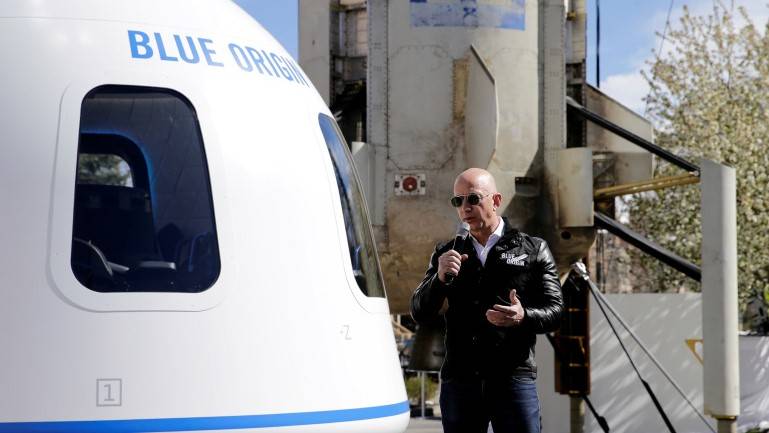 Trip to space with Jeff Bezos sells for $28 mn