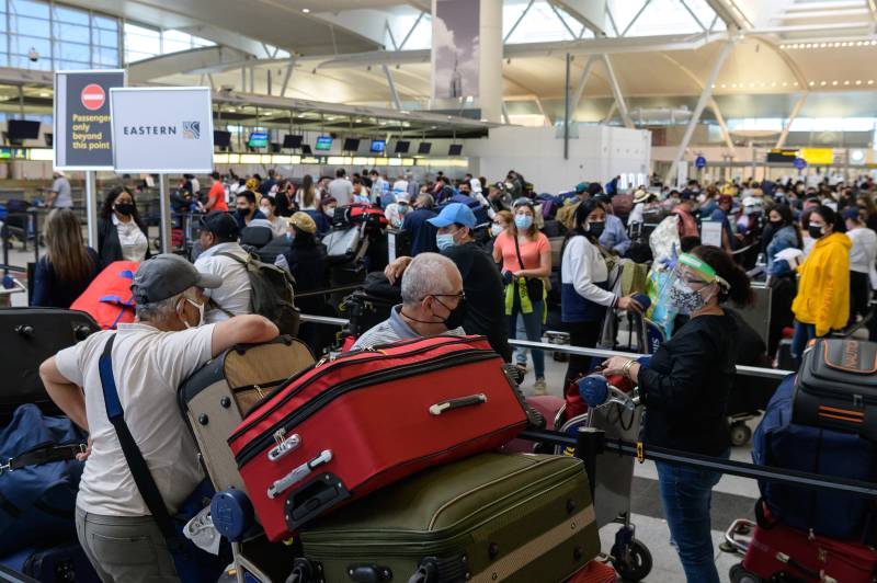 Sudden travel surge tests US airlines