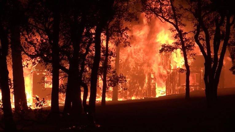 Heat warnings in western US and Canada as wildfires burn