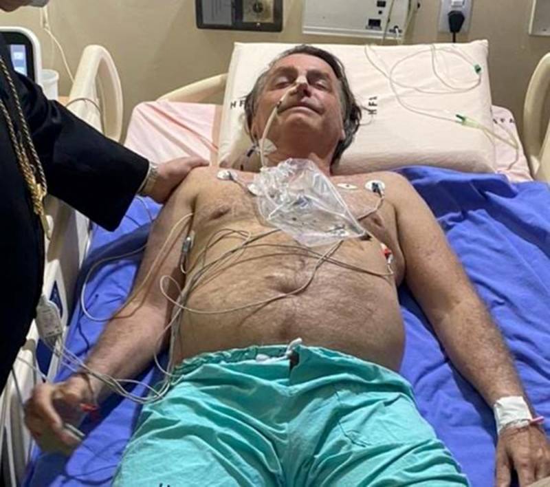 Brazil President Bolsonaro in hospital, may need surgery