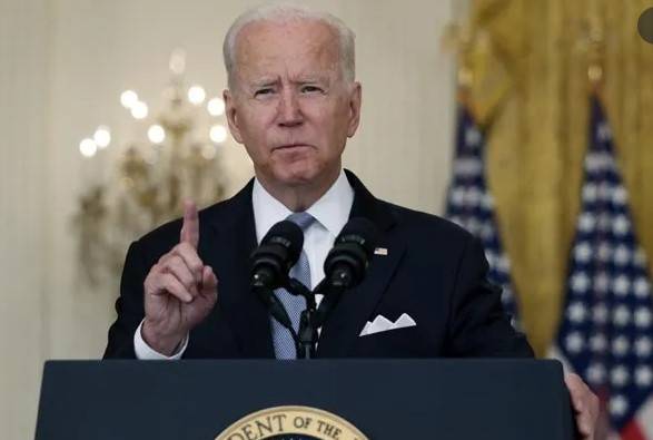 Biden warns may act against governors opposing school mask mandates