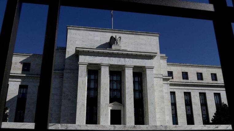 US Fed officials expect to pull back on stimulus this year