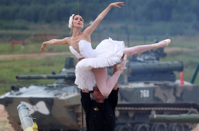 Ballet dancers perform on Russian military tanks