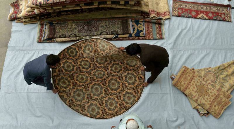 Kabul's carpet and antique dealers struggle after foreigners flee