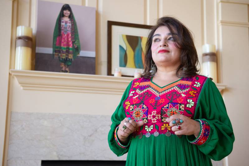 Social media campaign highlights colorful Afghan clothing to protest Taliban dress code