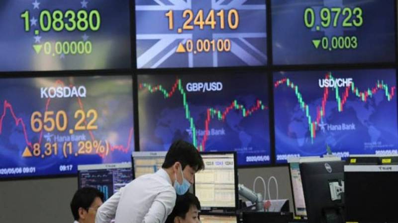 Asian markets swing as traders keep worried eye on inflation