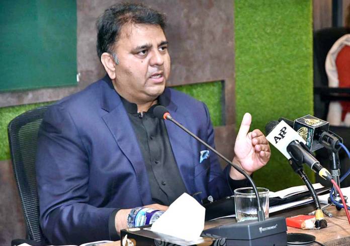 Fawad demands ECP to hold by-elections on EVM