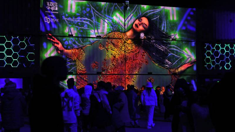 People attend the Soundstorm music festival, organized by MDLBEAST, in Banban on the outskirts of the Saudi capital Riyadh on December 16, 2021. AFP