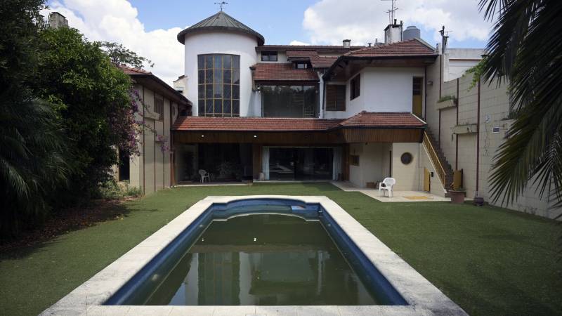 View of a house owned by the late Argentine football star Diego Maradona that was put on auction in Buenos Aires. AFP