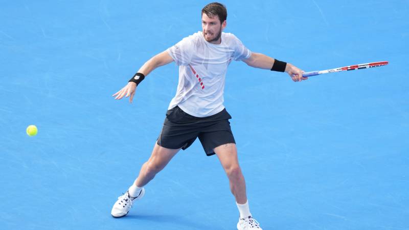 Cameron Norrie of Great Britain returns a shot against Reilly Opelka of the United States during the Finals of the Delray Beach Open. AFP