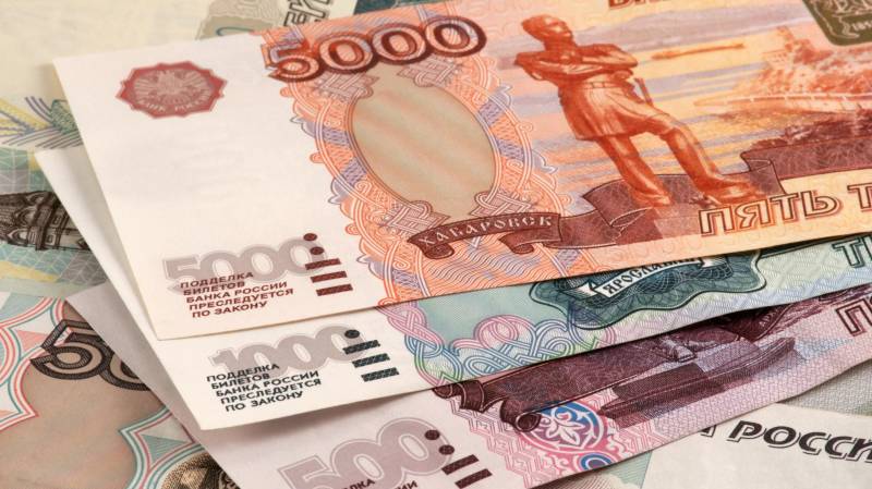 Russian ruble tanks almost 30% after latest sanctions