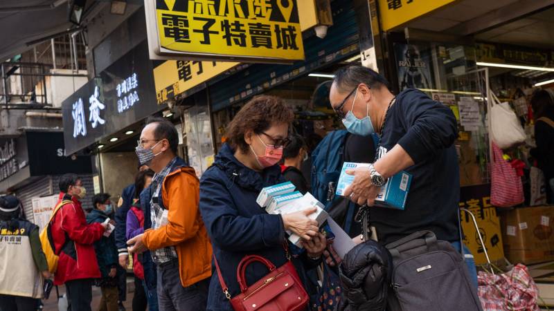 Virus-hit Hong Kong considers lockdown as bodies pile up