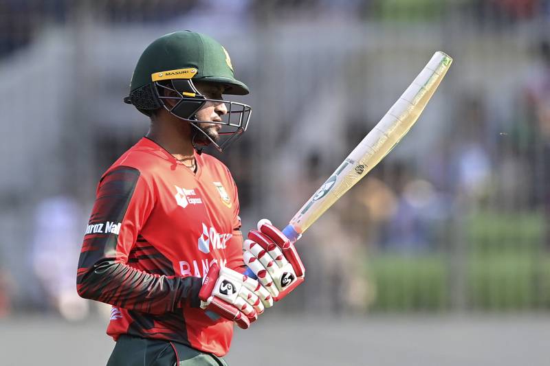 Bangladesh's Shakib Al Hasan reacts as he walks back to the pavilion after his dismissal during the second Twenty20 international cricket match between Bangladesh and Afghanistan at the Sher-e-Bangla National Cricket Stadium in Dhaka on March 5, 2022. AFP