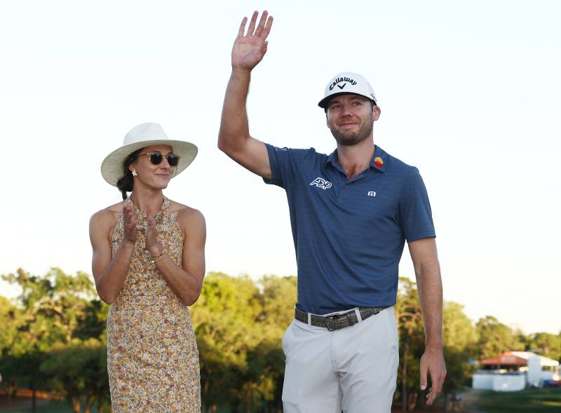 Sam Burns of the United States celebrates with his wife Caroline Campbell after defeating Davis Riley of the United States during a playoff in the final round of the Valspar Championship on the Copperhead Course. AFP