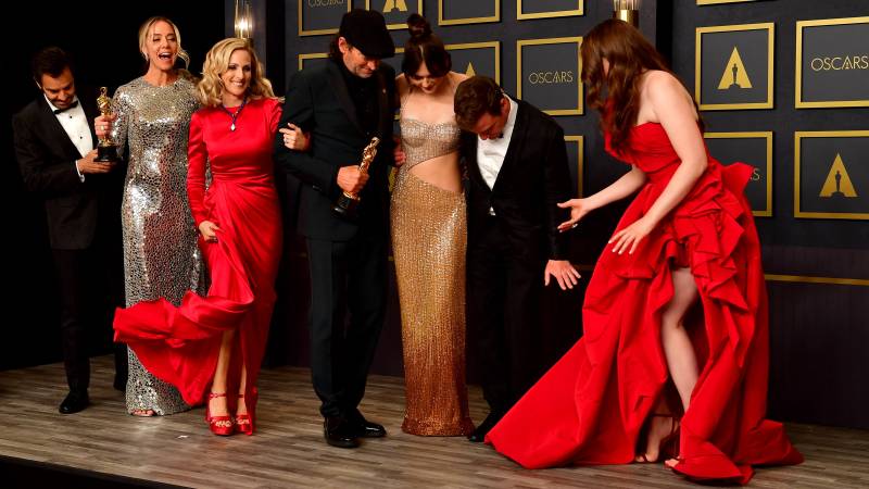 The cast of CODA, winner of Best Picture, arrive in the press room during the 94th Oscars at the Dolby Theatre in Hollywood, California. AFP