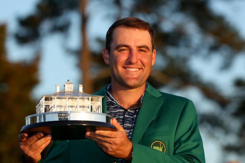 Scottie Scheffler poses with the Masters trophy during the Green Jacket Ceremony after winning the Masters at Augusta National Golf Club. AFP