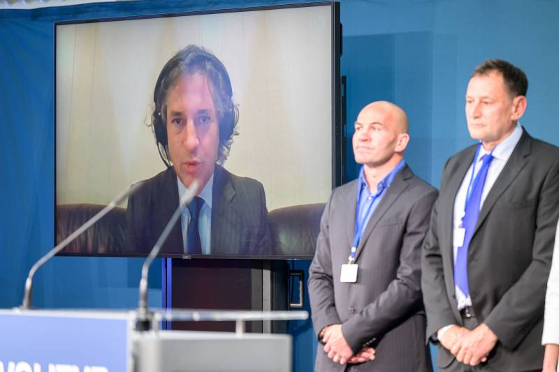 President of the liberal Freedom Movement party (Gibanje Svoboda) Robert Golob, on screen via videocall due to a positive covid test, delivers a speech after the general election, in Ljubljana. AFP