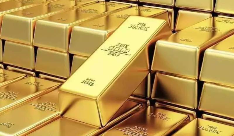 Gold price swells slightly, world rates decrease