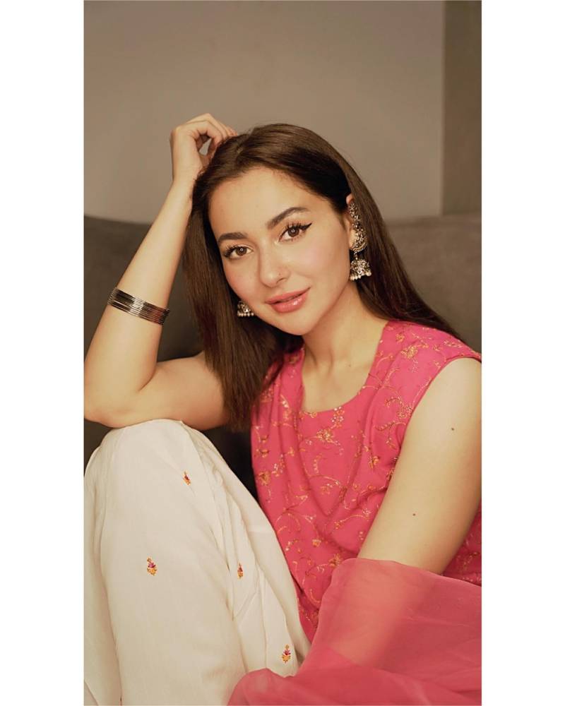 Hania Aamir flashes her dimpled smile in maroon wear