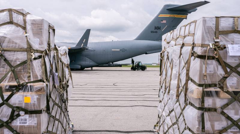 Pallets of formula is seen near a U.S. Air Force C-17 carrying 78,000 lbs of Nestlé Health Science Alfamino Infant and Alfamino Junior formula from Europe at Indianapolis Airport. AFP