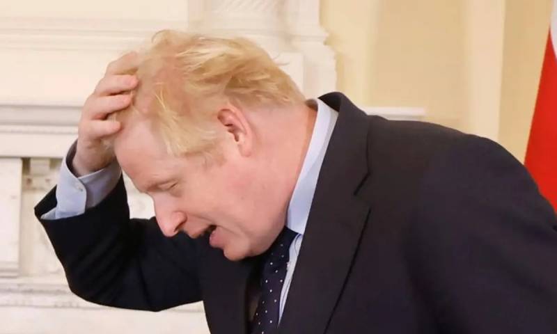 UK PM Johnson under fire over 'Partygate' photos