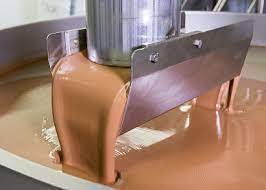 Two rescued from chocolate tank at US candy factory