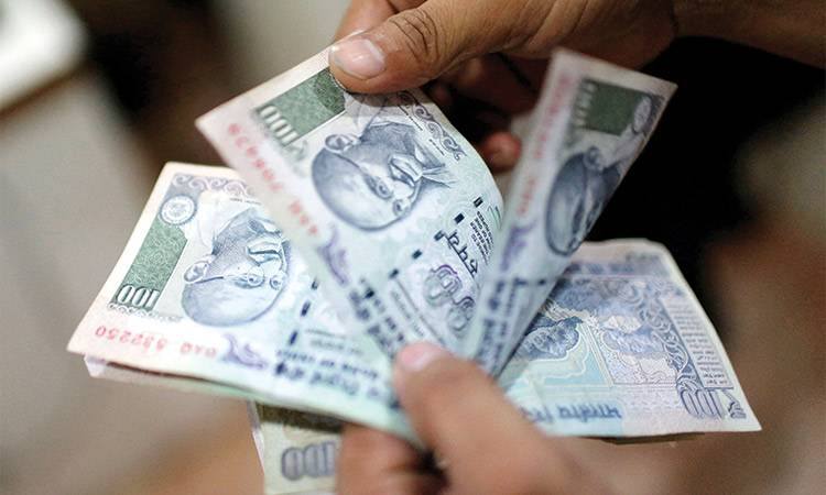 Indian rupee hits record low on Fed rate hike worries