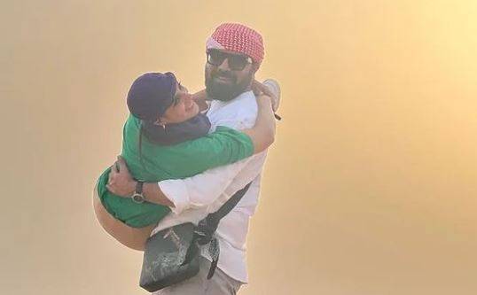 Naughty Yasir carries his ‘Bundle of Love’ in UAE desert