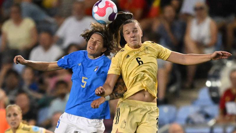 Italy's defender Elena Linari (L) vies against Belgium's striker Tine De Caigny to header the ball during the UEFA Women's Euro 2022 Group D football match between Italy and Belgium at Manchester City Academy Stadium in Manchester. AFP