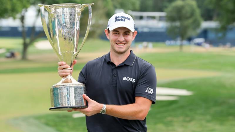 Patrick Cantlay of the United States poses with The Western Golf Association Trophy. AFP