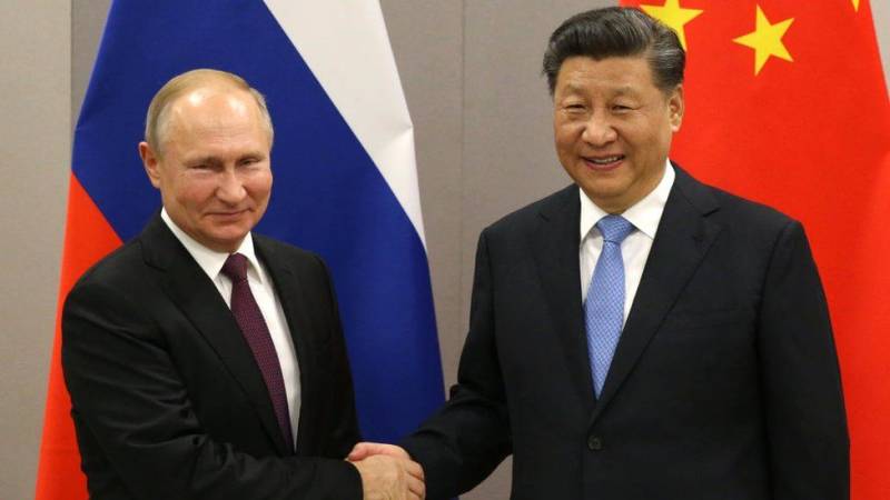 Presidents Putin, Xi meet for high-stakes talks in challenge to West