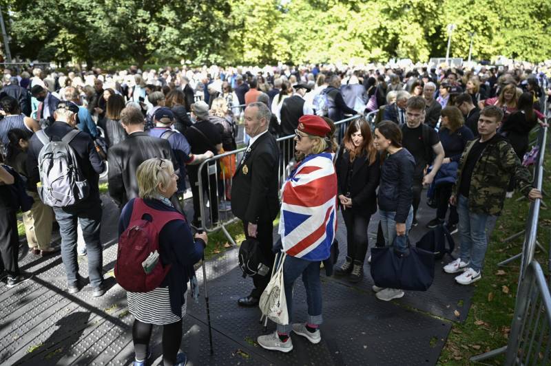 King Charles welcomed in Wales as long London queue hits limit