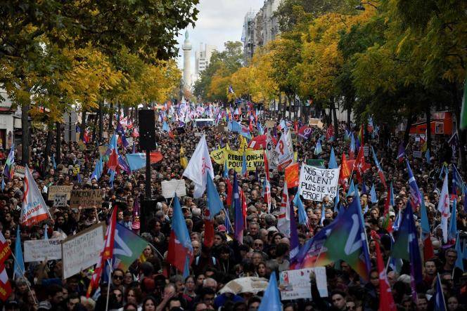 Protesters march in Paris as French refinery strikes continue