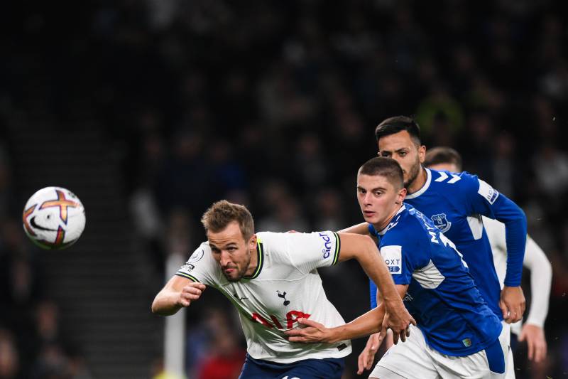 Tottenham Hotspur's English striker Harry Kane (L) and Everton's Ukrainian defender Vitaliy Mykolenko (R) eye the ball as they fight for it during the English Premier League football match between Tottenham Hotspur and Everton at Tottenham Hotspur Stadium in London. AFP