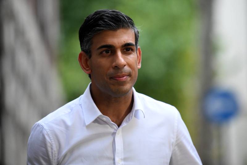 Britain's former Chancellor of the Exchequer, Conservative MP, Rishi Sunak leaves from an ofice in central London. AFP