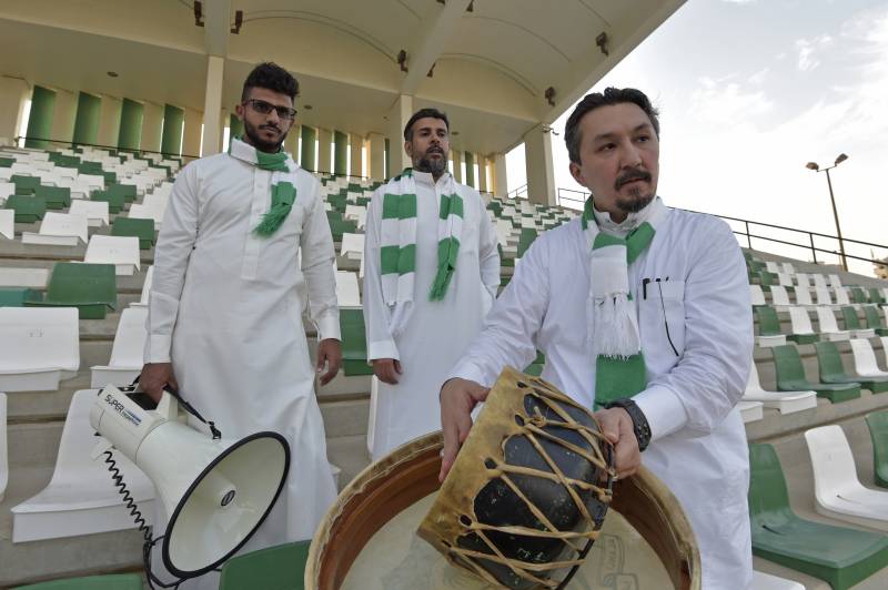 Saudi national football team fan and the head of the fan association for the prestigious Jeddah-based Saudi club Al-Ahly, Bader Turkistani, poses for a picture. AFP