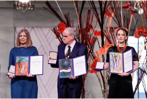 A trio from the three nations at the centre of the war in Ukraine accepted their Nobel Peace Prize on Saturday