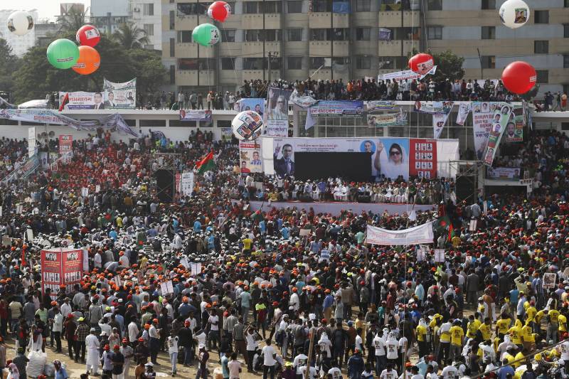 Supporters of the Bangladesh Nationalist Party (BNP) gather during the party's last divisional rally in Dhaka. AFP