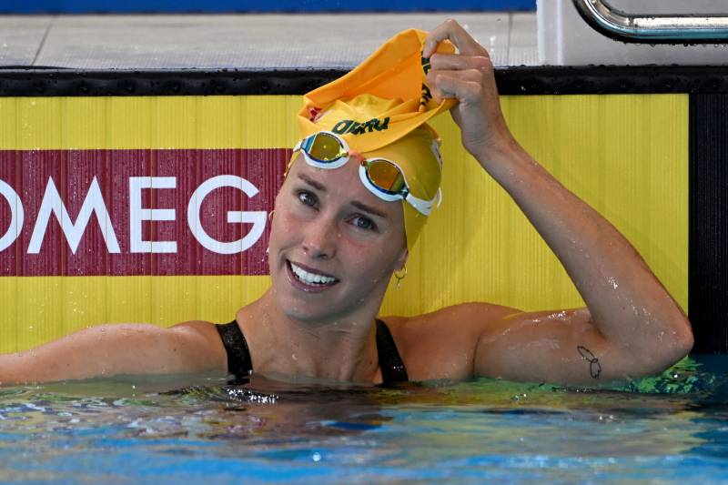 Emma McKeon of Australia celebrates winning the gold medal in the women's 100m freestyle final at the FINA World Swimming Championships