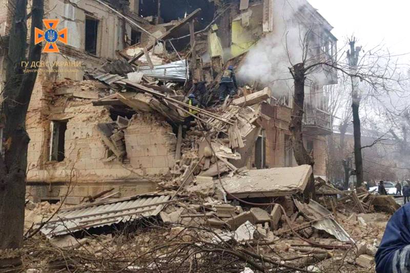 Rescuers working at a three-store building heavily damaged following a Russian missile strike in Ukrainian city of Kryvyi Rih. AFP