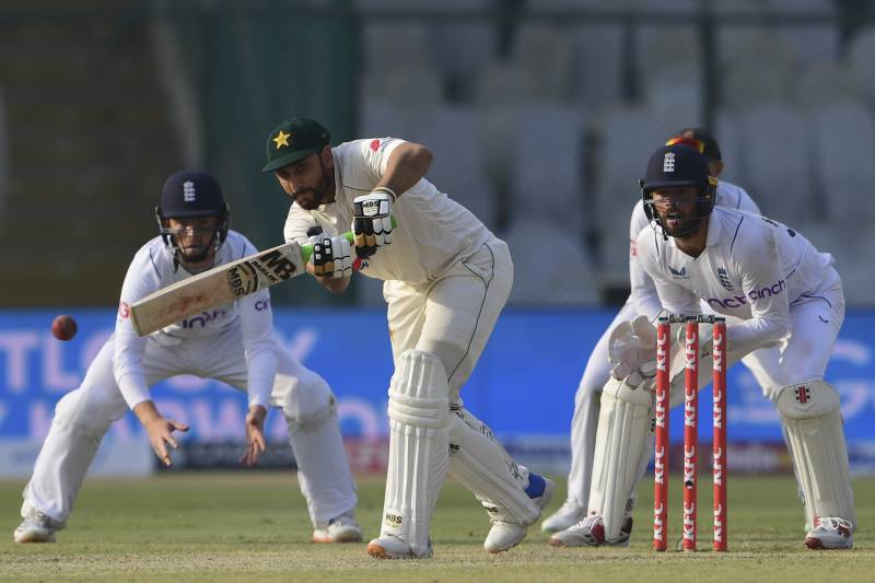 Pakistan\'s Agha Salman (C) plays a shot during the first day of the third cricket Test match between Pakistan and England at the National Stadium in Karachi. AFP